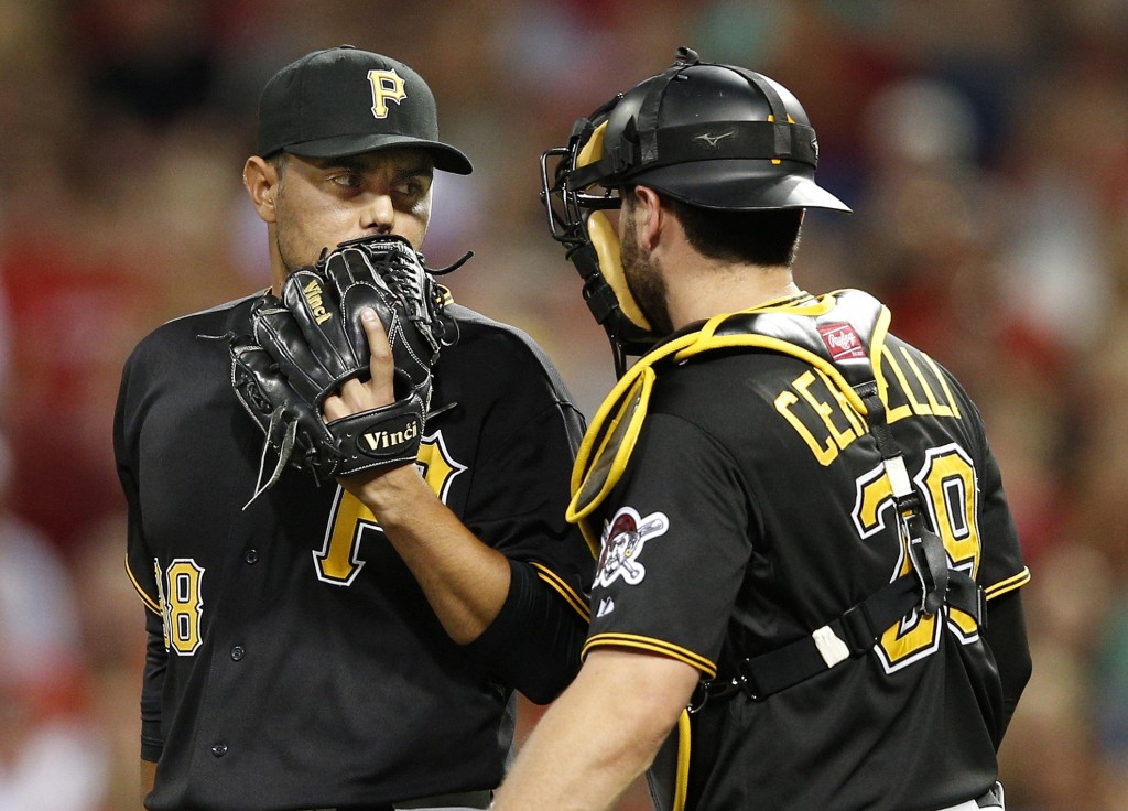 CINCINNATI, OH - JULY 31: Joakim Soria #38 and Francisco Cervelli #29 of the Pittsburgh Pirates talk in the seventh inning against the Cincinnati Reds at Great American Ball Park on July 31, 2015 in Cincinnati, Ohio. The Pirates defeated the Reds 5-4. (Photo by Joe Robbins/Getty Images)