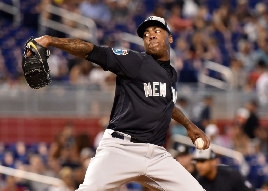 Apr 2, 2016; Miami, FL, USA; New York Yankees relief pitcher Aroldis Chapman (54) throws in the sixth inning during a spring training game against the Miami Marlins at Marlins Park. Mandatory Credit: Steve Mitchell-USA TODAY Sports