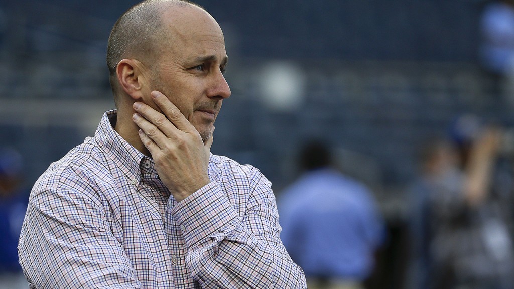 New York Yankees general manager Brian Cashman watches batting practice before a baseball game against the Kansas City Royals, Thursday, May 12, 2016, in, New York. (AP Photo/Julie Jacobson)