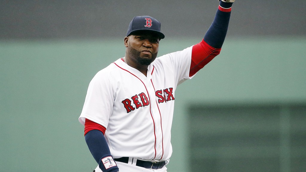 Boston Red Sox's David Ortiz waves to the crowd during ceremonies to honor his retirement before a baseball game against the Toronto Blue Jays in Boston, Sunday, Oct. 2, 2016. (AP Photo/Michael Dwyer)