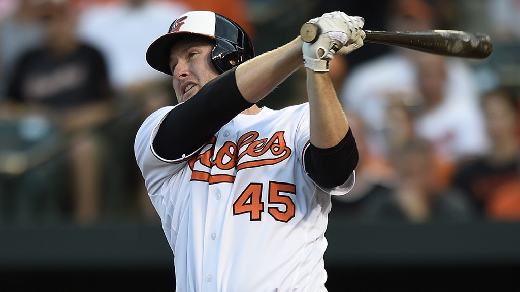 FILE - In this Aug. 18, 2016, file photo, Baltimore Orioles' Mark Trumbo follows through on a three-run home run against the Houston Astros during a baseball game in Baltimore. Trumbo, who led the major leagues with 47 home runs after hitting 13 for Seattle in 2015, was voted the AL comeback award in the annual Players Choice Awards of the Major League Baseball Players Association. (AP Photo/Gail Burton, File)