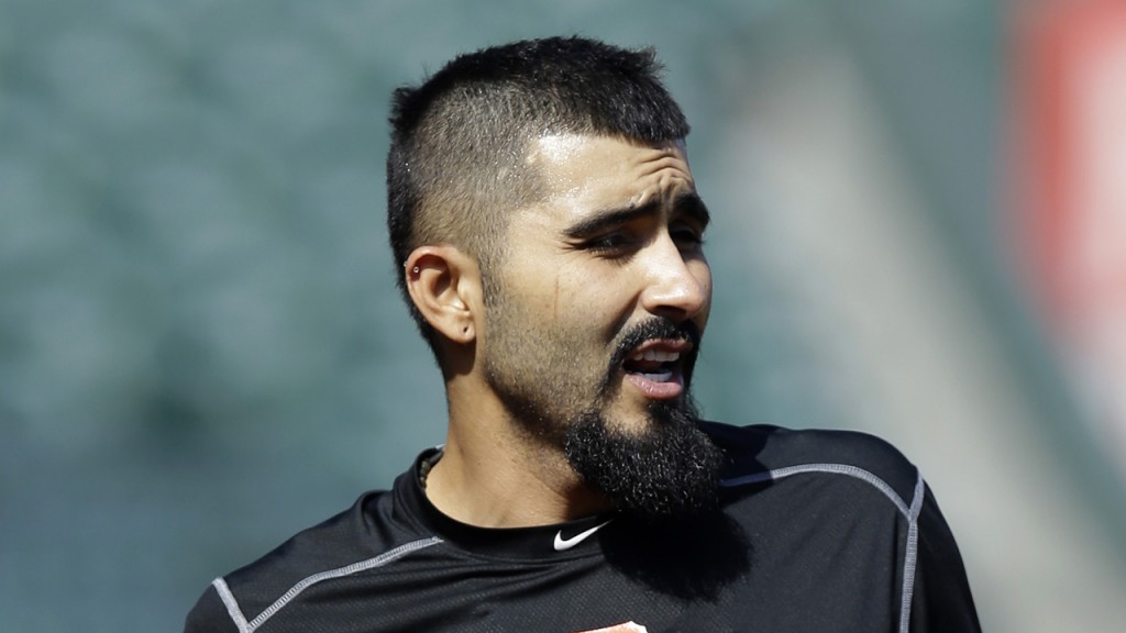 San Francisco Giants' Sergio Romo walks to batting practice prior to a baseball game against the Los Angeles Dodgers Wednesday, April 22, 2015, in San Francisco. (AP Photo/Ben Margot)