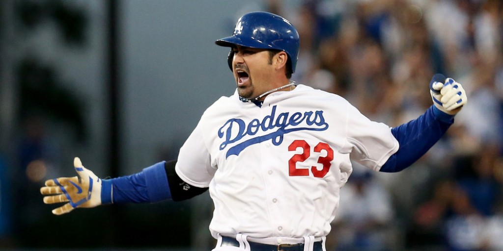 LOS ANGELES, CA - OCTOBER 14:  Adrian Gonzalez #23 of the Los Angeles Dodgers reacts on second base after he hits a RBI double in the fourth inning against the St. Louis Cardinals in Game Three of the National League Championship Series at Dodger Stadium on October 14, 2013 in Los Angeles, California.  (Photo by Stephen Dunn/Getty Images)