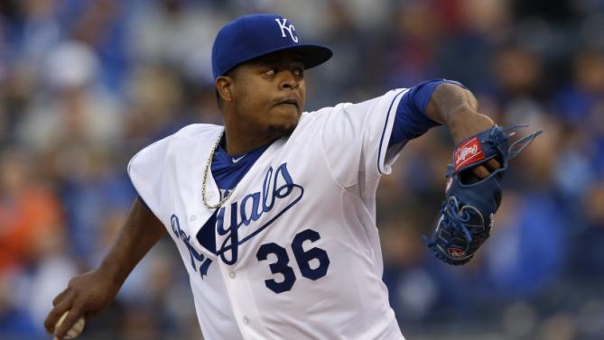 Kansas City Royals starting pitcher Edinson Volquez delivers to a Minnesota Twins batter during the first inning of a baseball game at Kauffman Stadium in Kansas City, Mo., Monday, April 20, 2015. (AP Photo/Orlin Wagner)