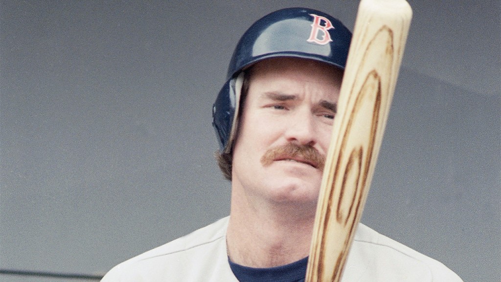 Wade Boggs, leaf off hitter for the Boston Red Sox, looks over his bat during a brief practice, Thursday, Oct. 9, 1986, Anaheim, Ca. The Red Sox go against the California Angels in game three of the AL Championship Series on Friday, Oct. 9, 1986 at night. (AP Photo/Reed Saxon)