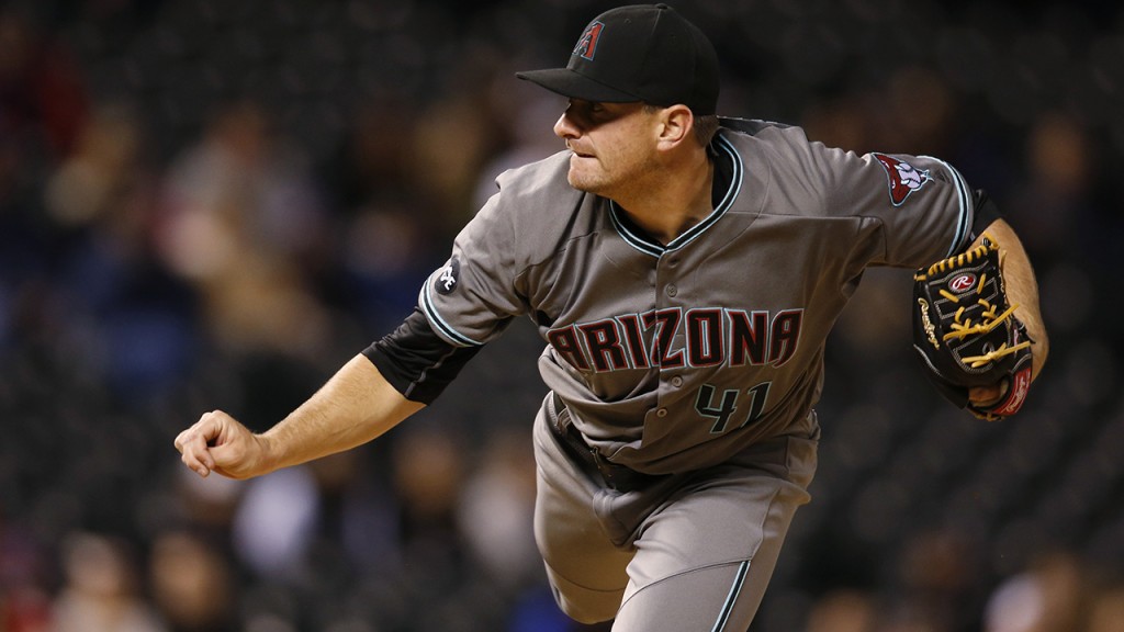 Arizona Diamondbacks reliever Daniel Hudson watches a pitch to Colorado Rockies' Carlos Gonzalez during the eighth inning of a baseball game Tuesday, May 10, 2016, in Denver. Arizona won 5-1. (AP Photo/David Zalubowski)